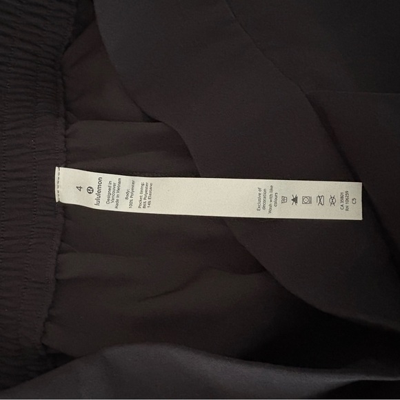 LULULEMON sz 4 With The Flow Black Pants Wrap Front Travel Woven - Picture 7 of 7